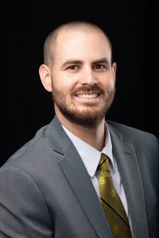 Mr. Adam Warren